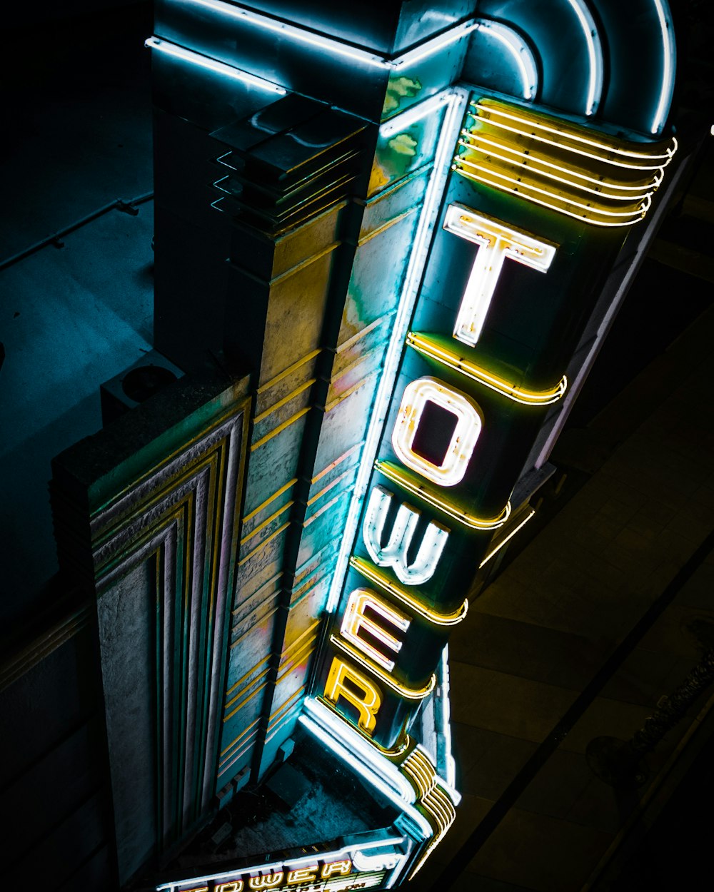 green and yellow led light signage