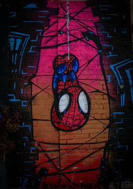 A vibrant superhero-themed illustration showing a digital agent helping a small business soar online.