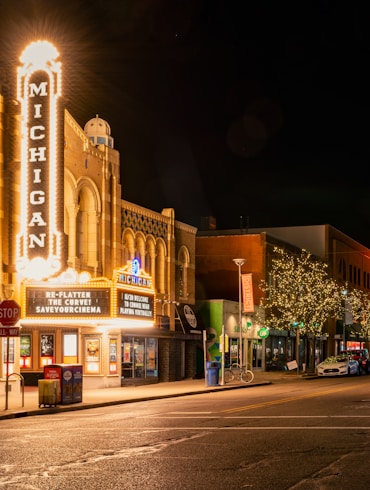 white and brown concrete building during nighttime