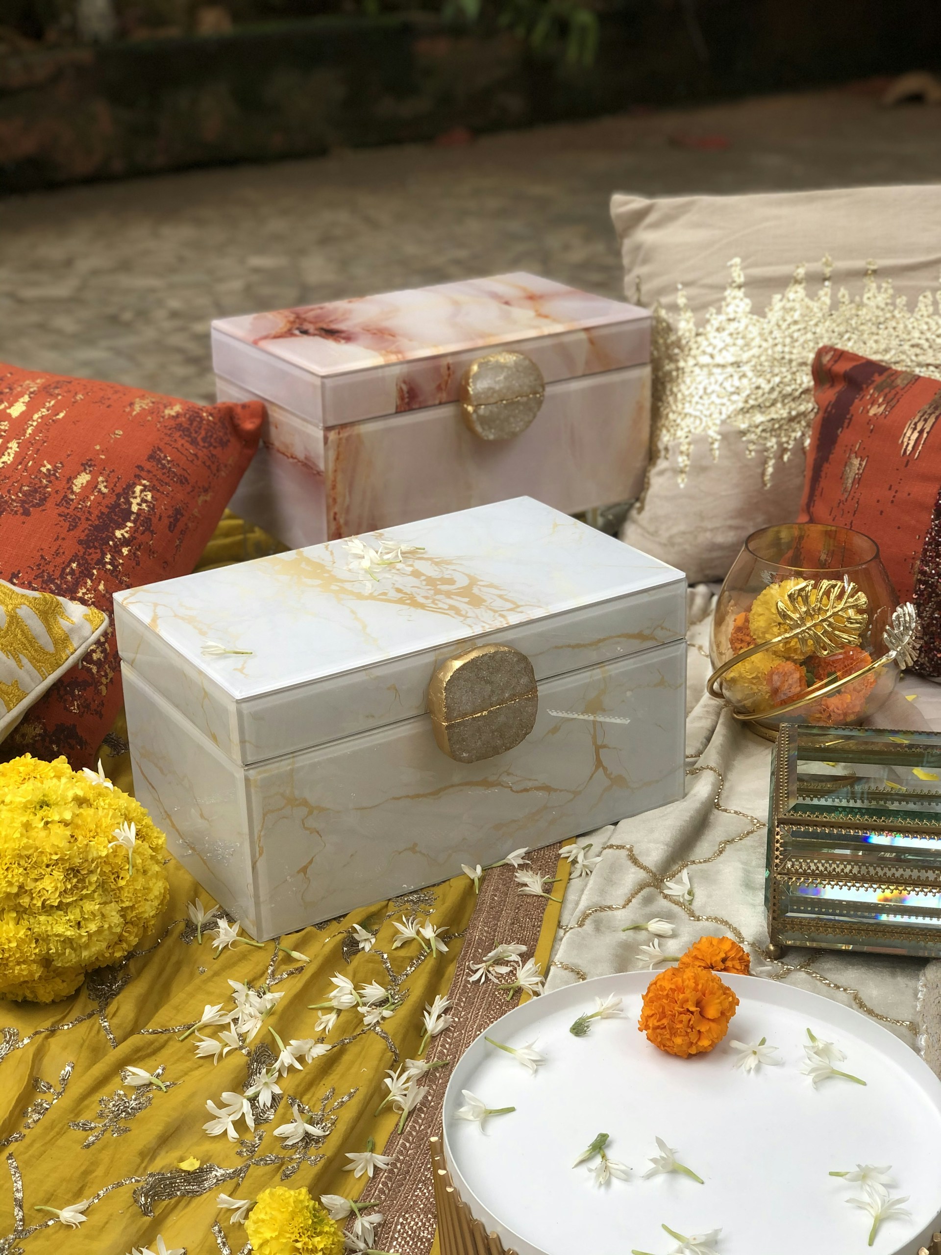 A beautifully arranged set of VIP and flower boxes in rich textures and vibrant colors, highlighting premium quality.