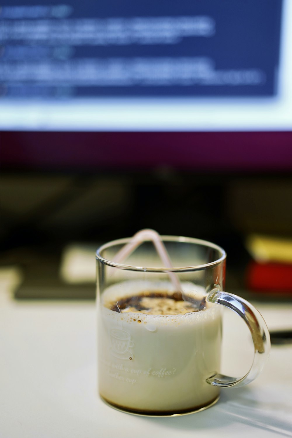 clear glass mug with white liquid