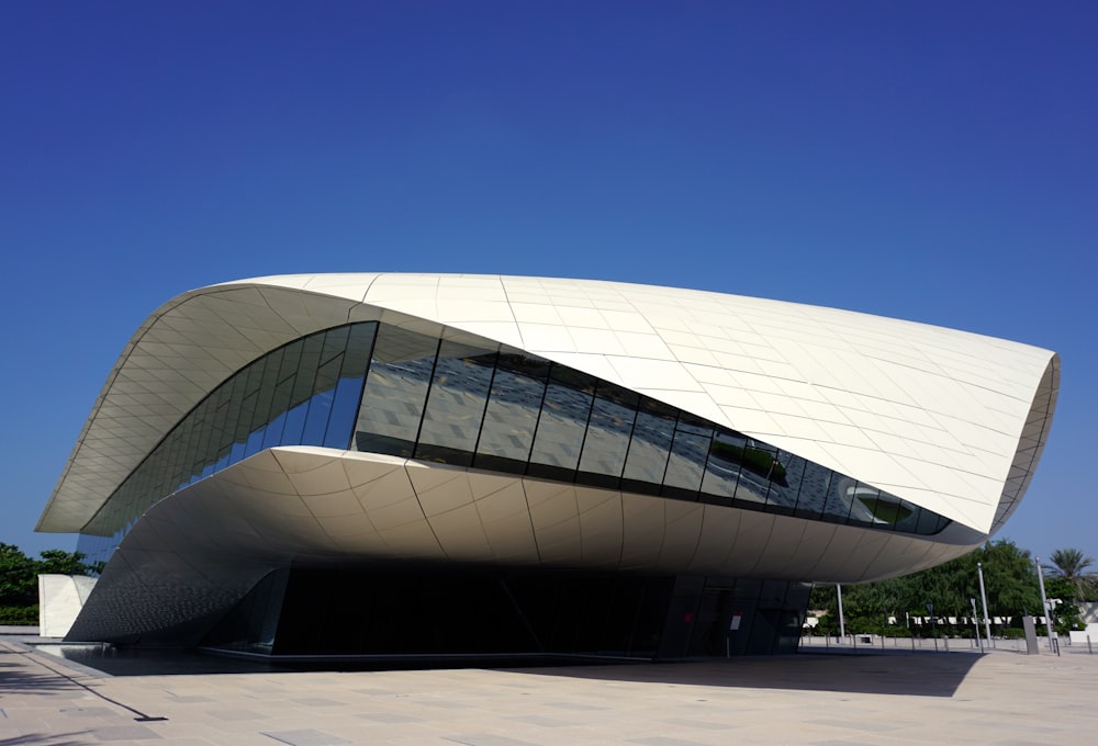 white and black concrete building under blue sky during daytime