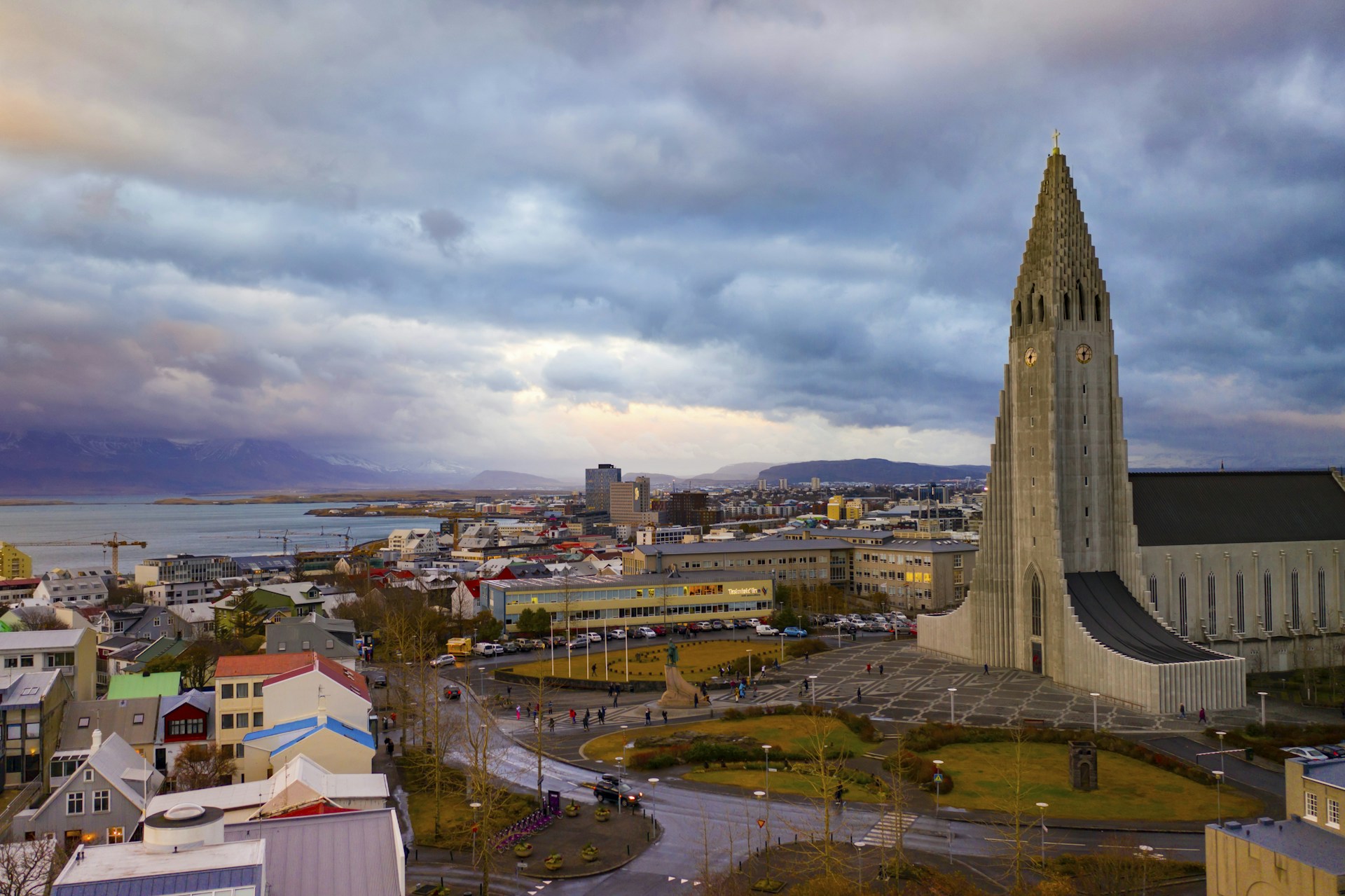 a view of a city with a very tall tower