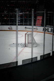 A detailed view of puckpro supply’s branded hockey pucks stacked on a counter.