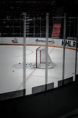 A detailed view of puckpro supply’s branded hockey pucks stacked on a counter.