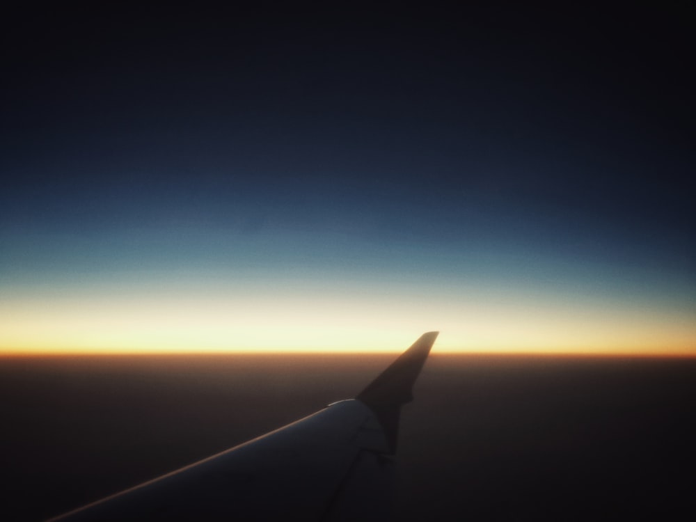 airplane wing during night time