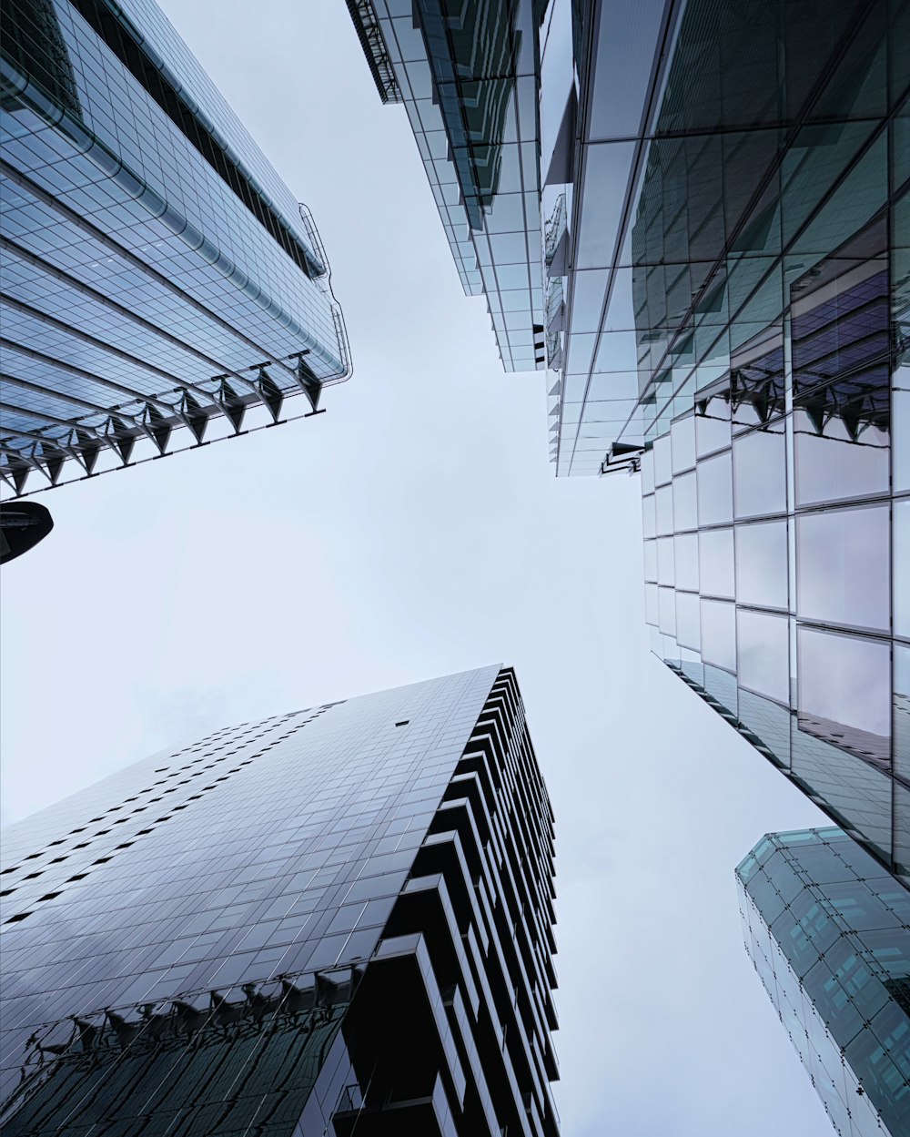 low angle photography of high rise buildings