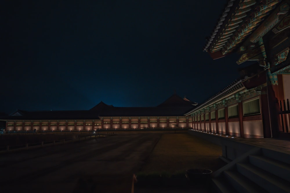 brown wooden bridge during night time