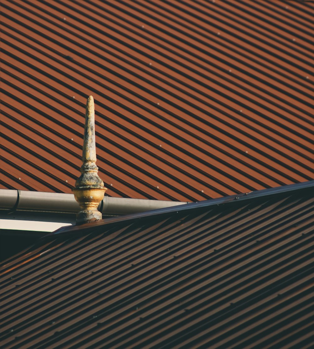 brown roof with white and gold tower