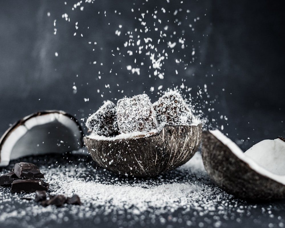 brown wooden bowl on white snow