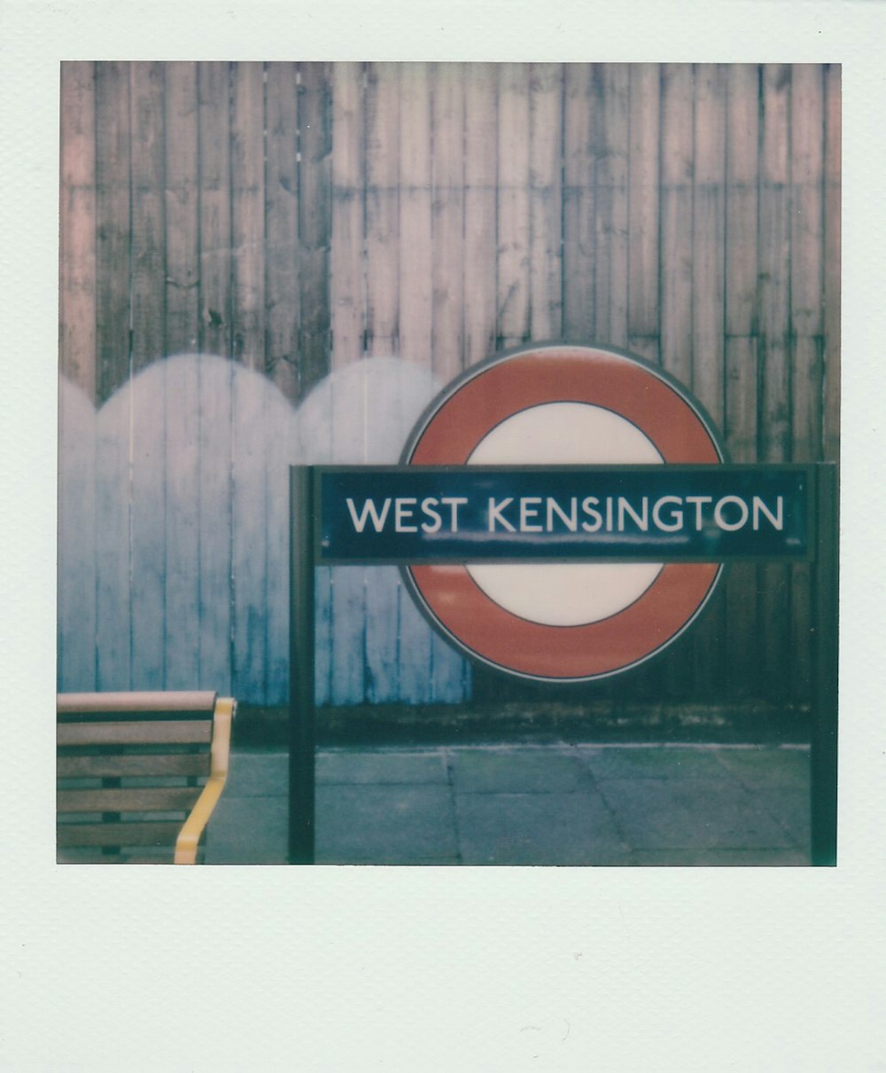 a picture of a street sign in front of a building