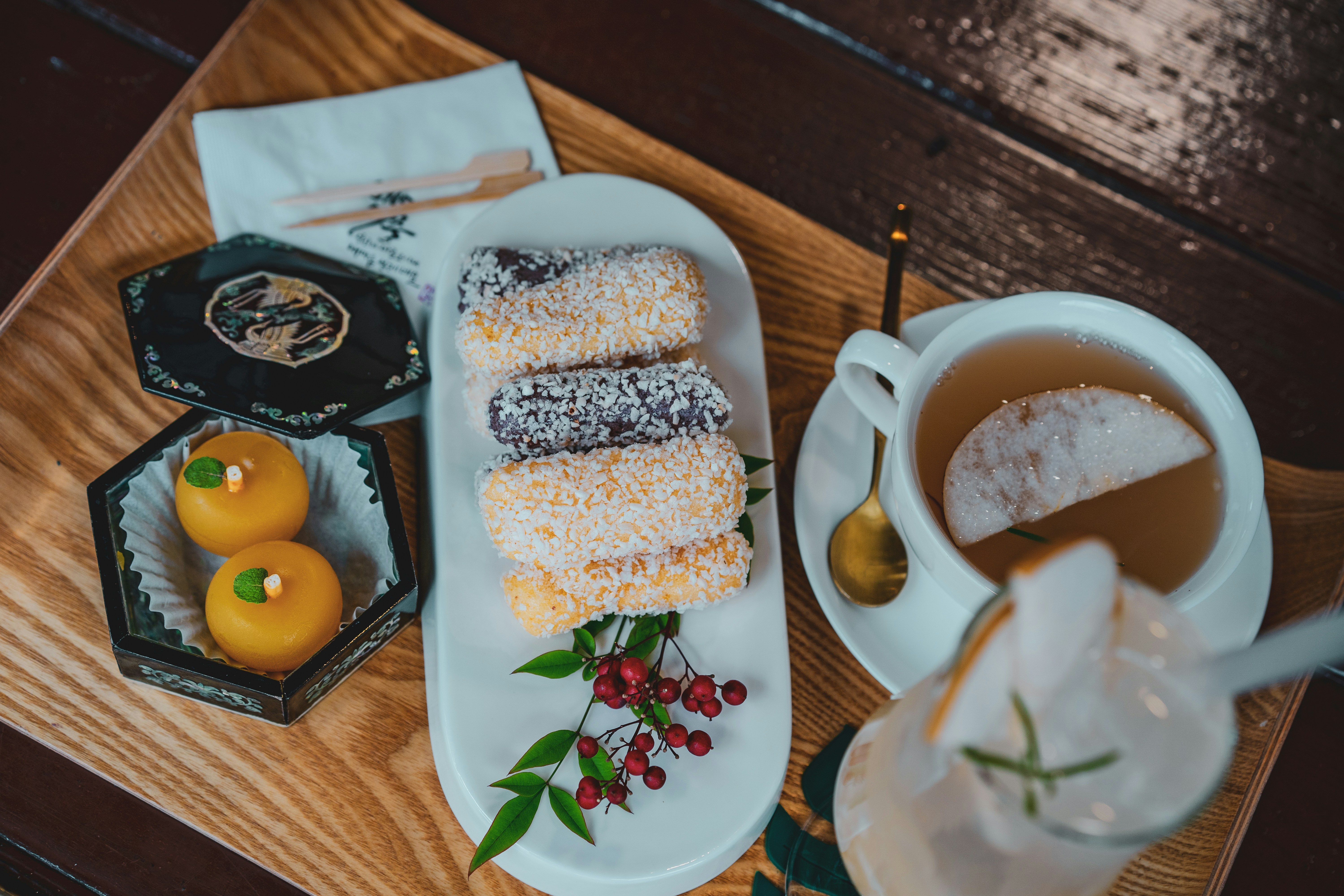 white ceramic plate with food on brown wooden table, 