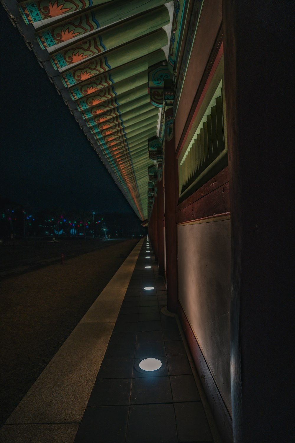 brown wooden staircase with lights during night time