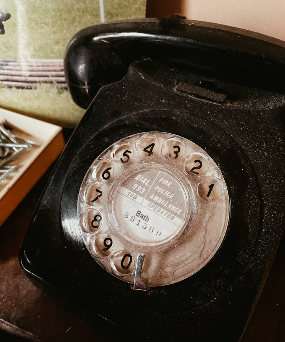 black and silver rotary phone