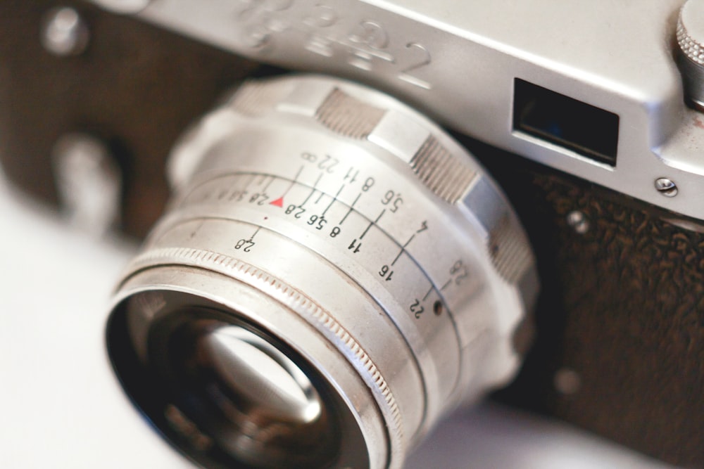 silver and black camera lens