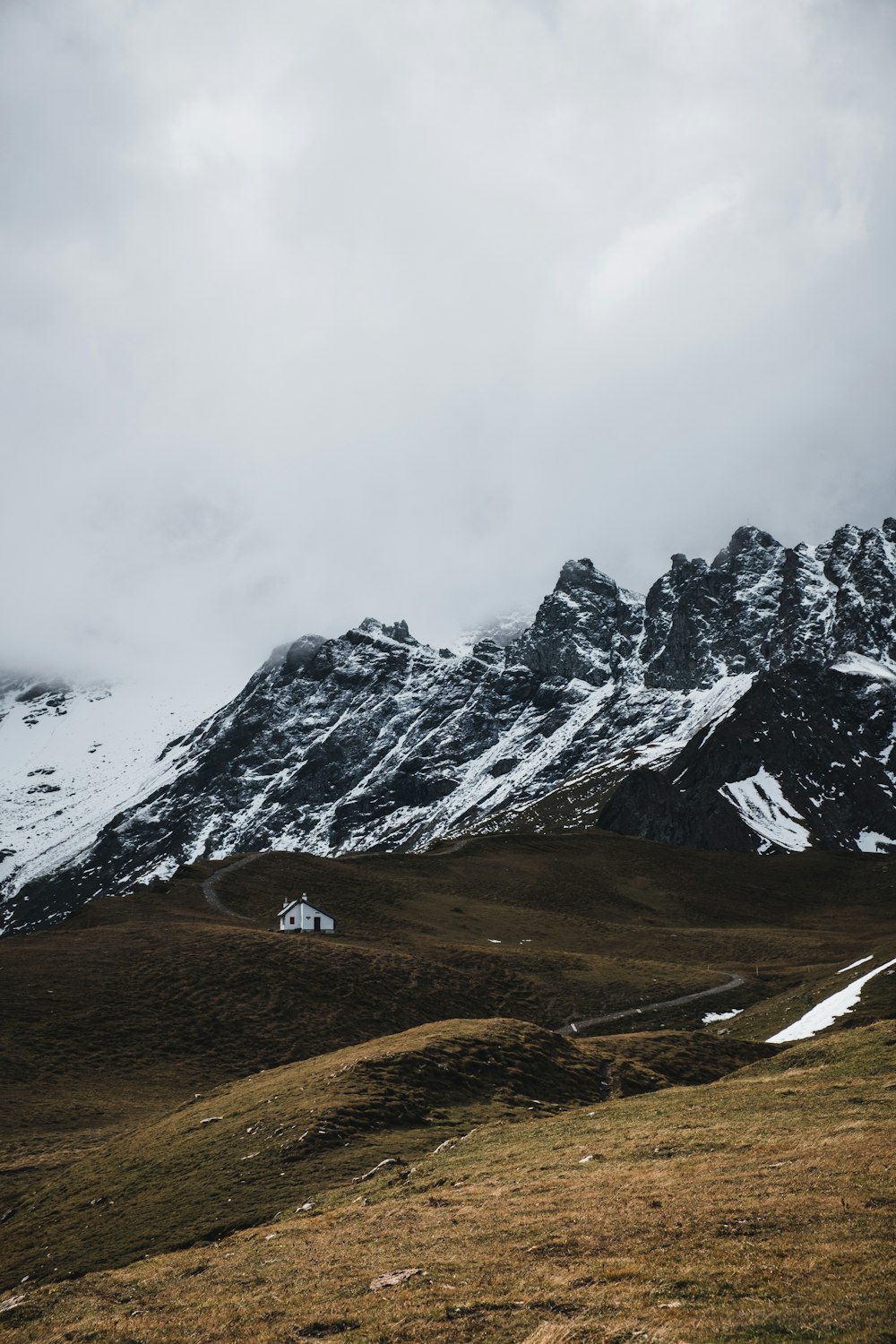 snow covered mountain during daytime