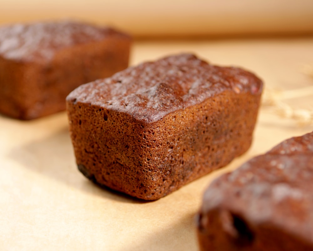 brown and black bread on white table