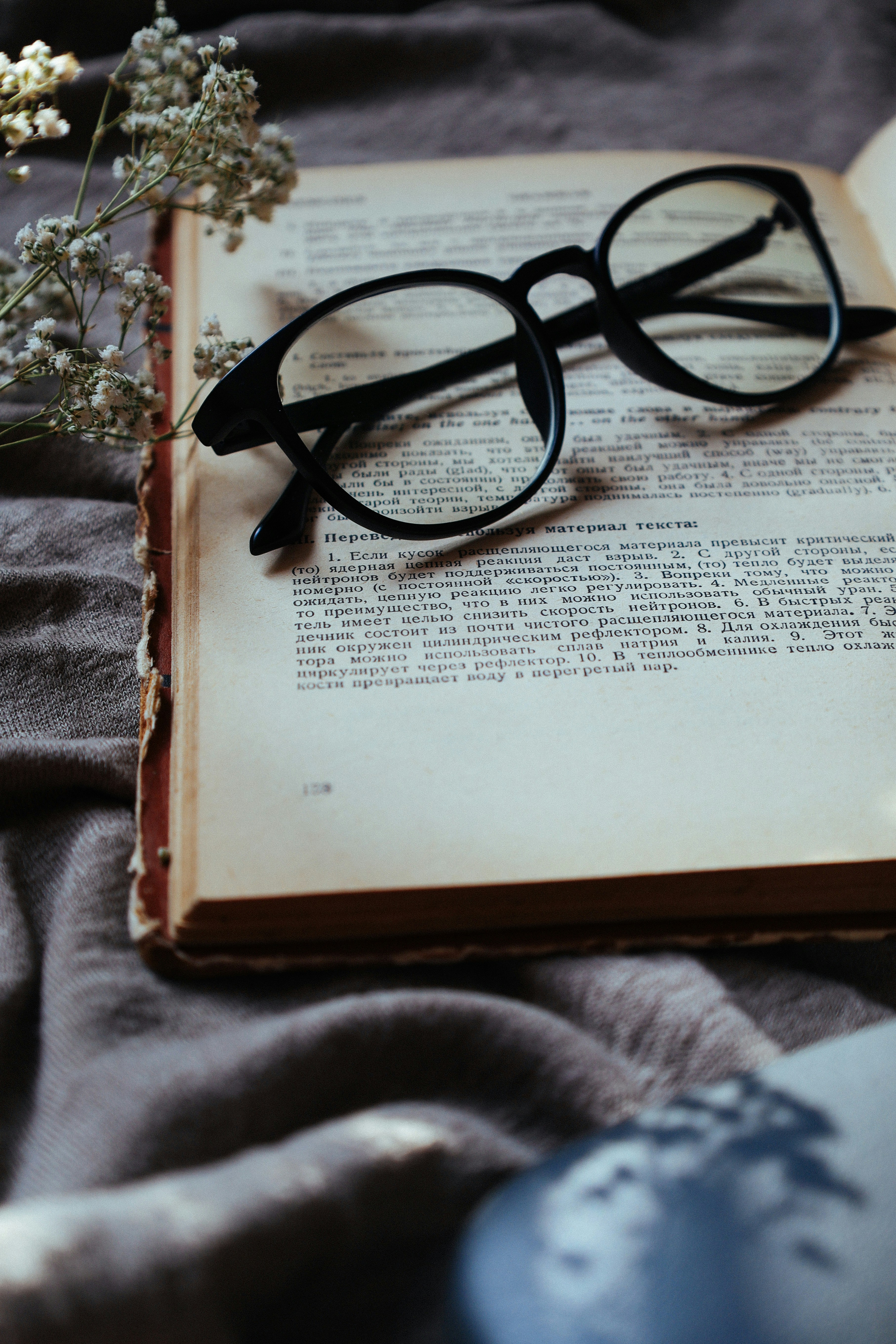 black eyeglasses on with printer paper