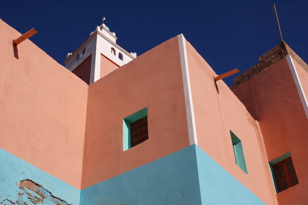 pink and white concrete building