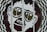 A large graphic of a stylized face with prominent oversized glasses displaying the word 'GO'. The image is part of a glass door with a surrounding black and white checkered circular pattern. The facial features are minimalist and cartoon-like, presenting a playful and eye-catching design.