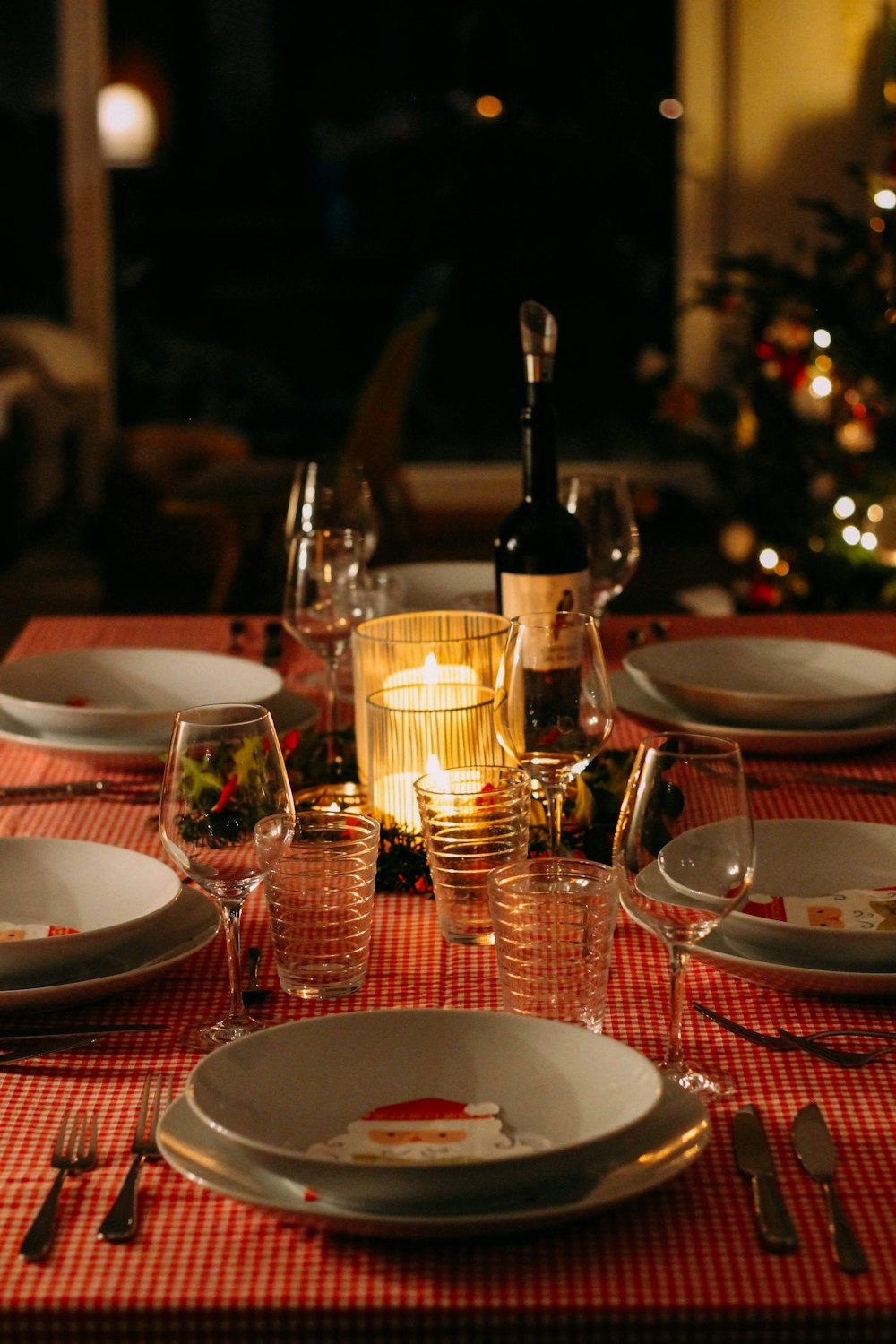 wine glasses on red ceramic plate