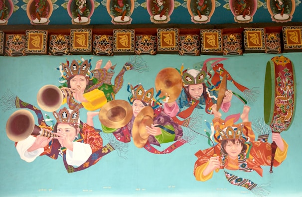 A vibrant collage of musicians and painters from diverse cultures sharing their craft.