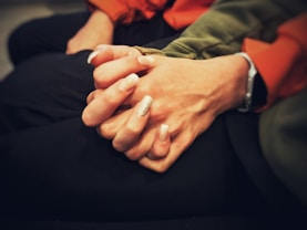 person in black pants with silver ring