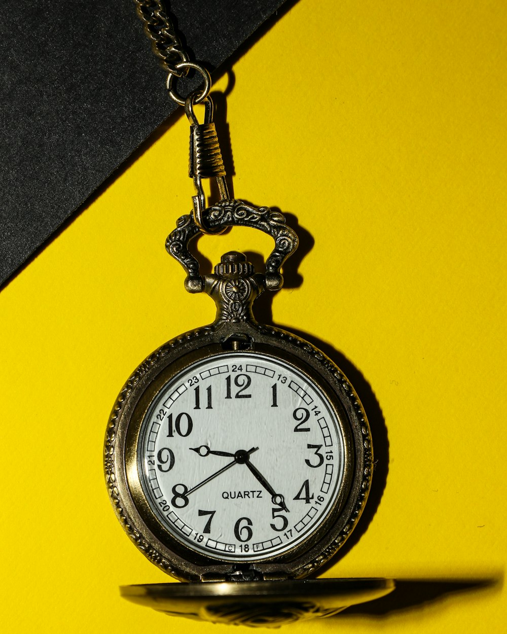 black and silver pocket watch