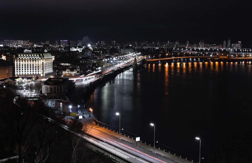 city lights turned on during night time