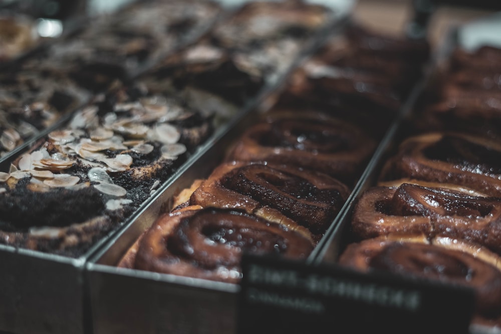 brown and white pastries on stainless steel tray