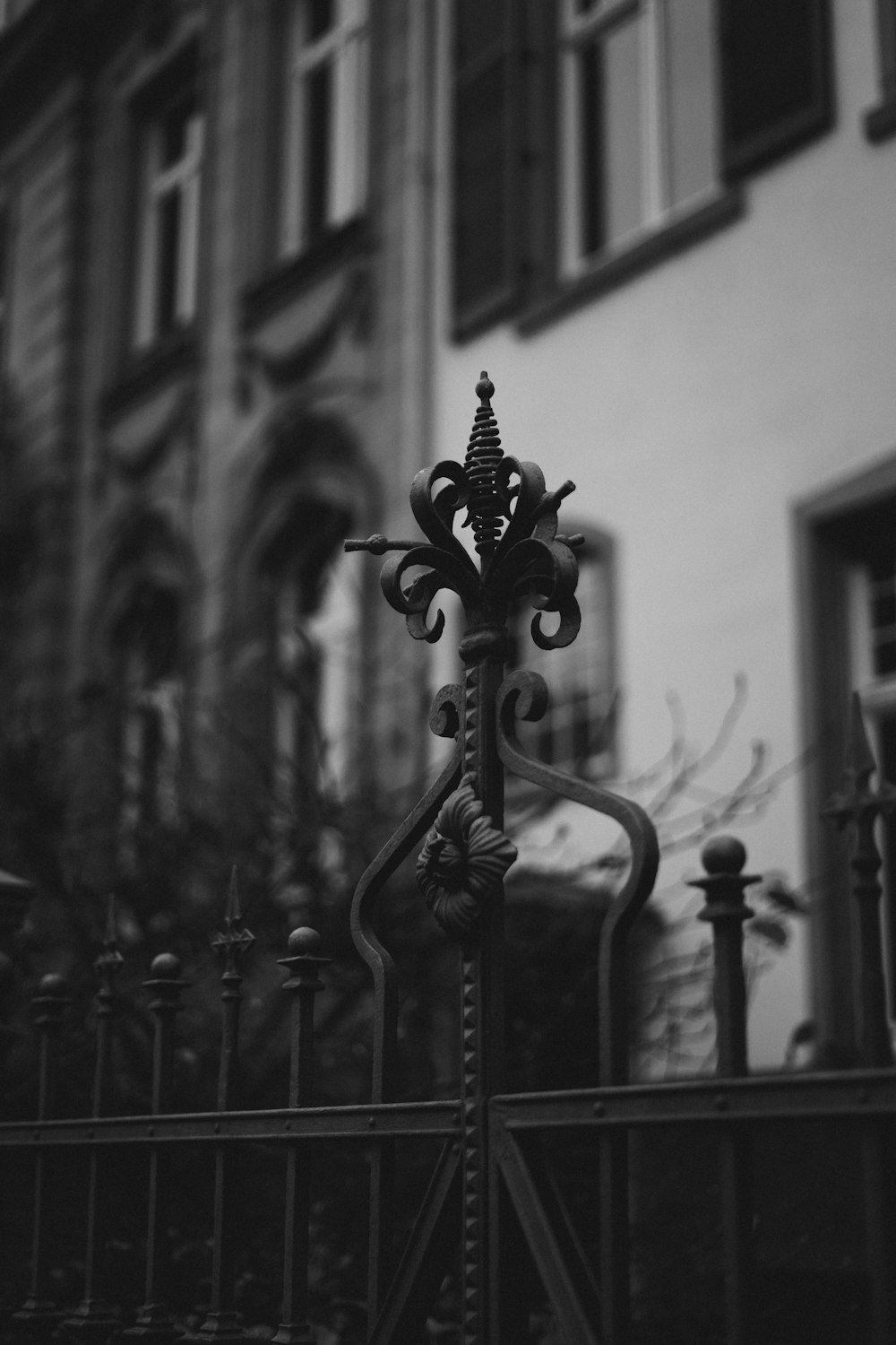 black metal candle holder in grayscale photography