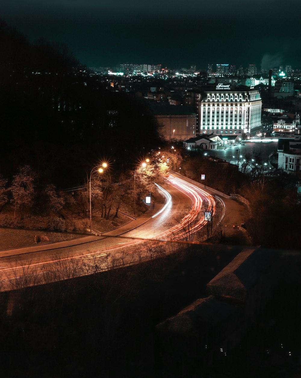 time lapse photography of cars on road during night time