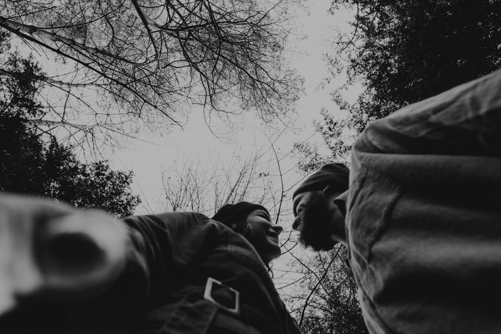 grayscale photo of man in jacket