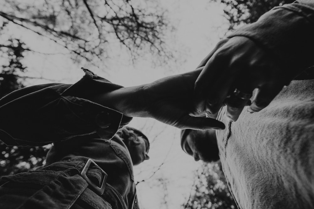 grayscale photo of man in button up shirt