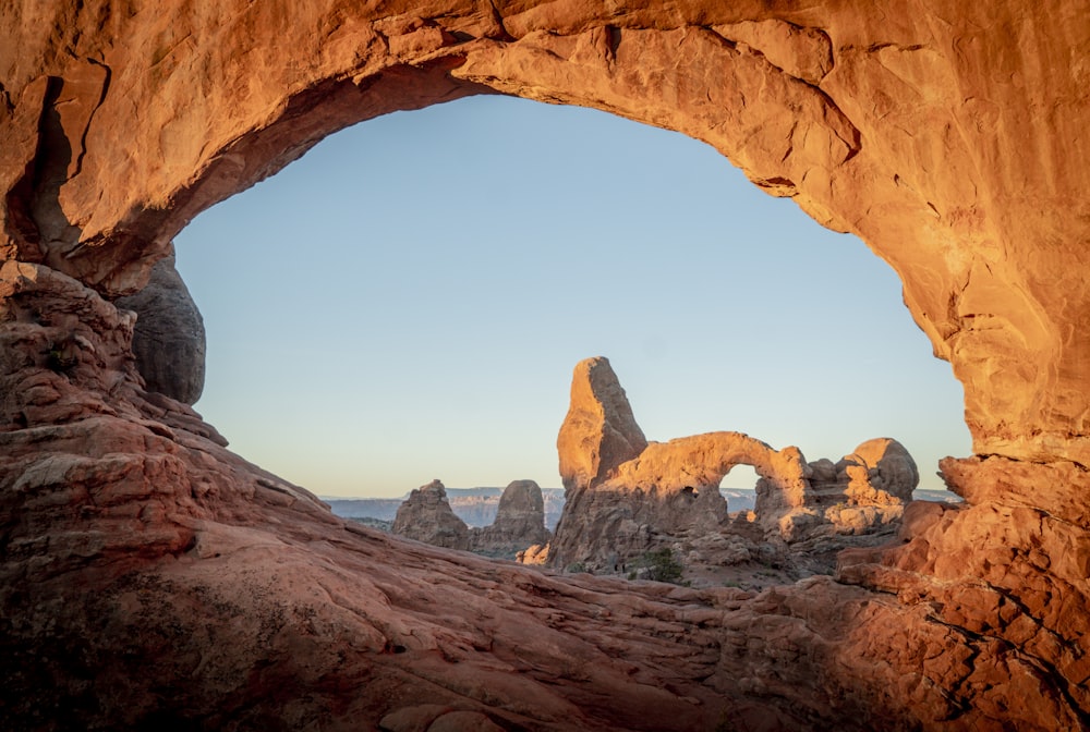 brown rock formation under blue sky during daytime