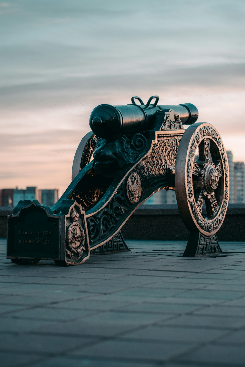 black and gold metal coin operated telescope