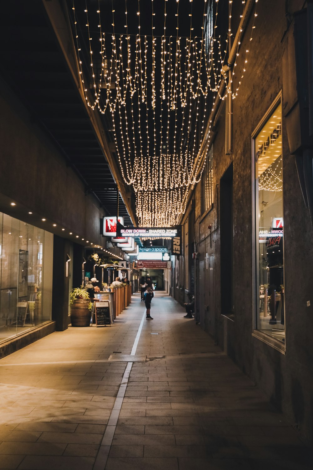 people walking on sidewalk during daytime