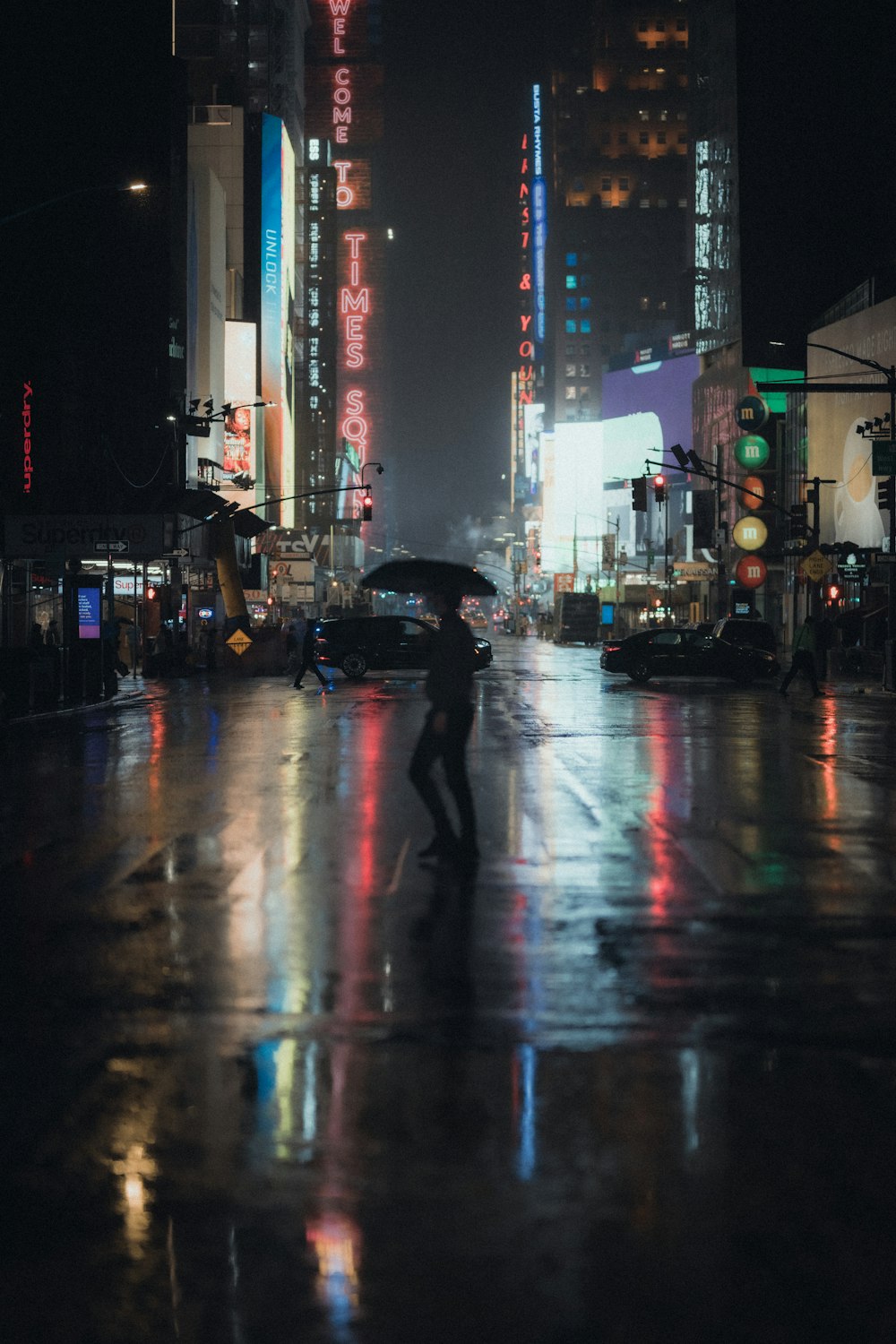 people walking on street during night time