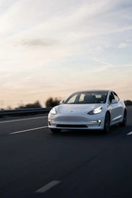 white bmw m 3 on road
