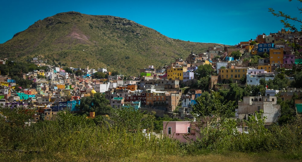 a city with a mountain in the background