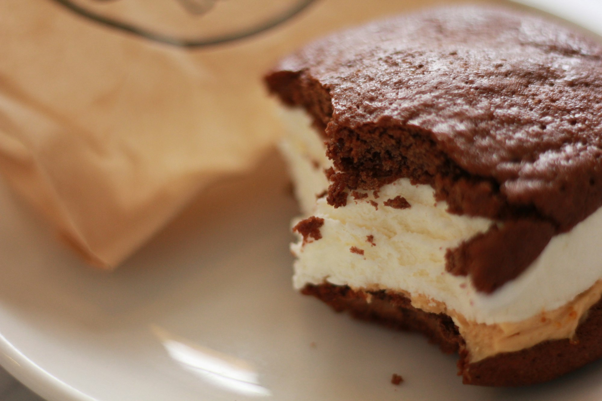 Decadent chocolate cookies with ice cream in a sandwich