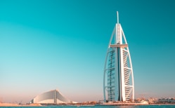 white metal bridge under blue sky during daytime