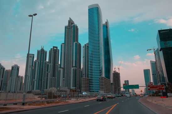 A bustling financial district with modern skyscrapers and people engaged in business activities.