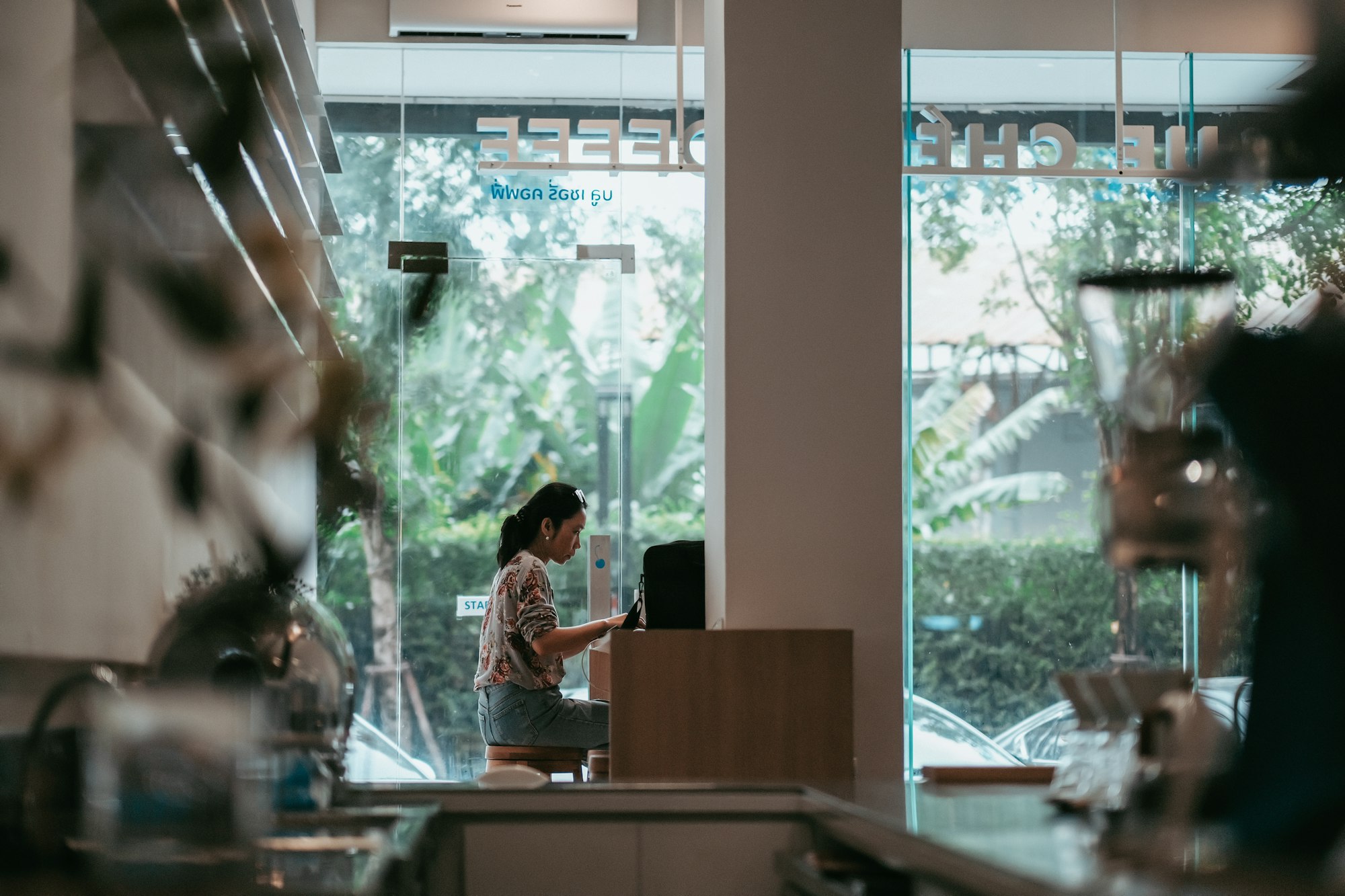 Woman working from a cafe