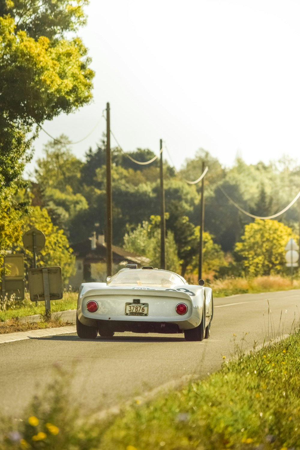 white car on road during daytime