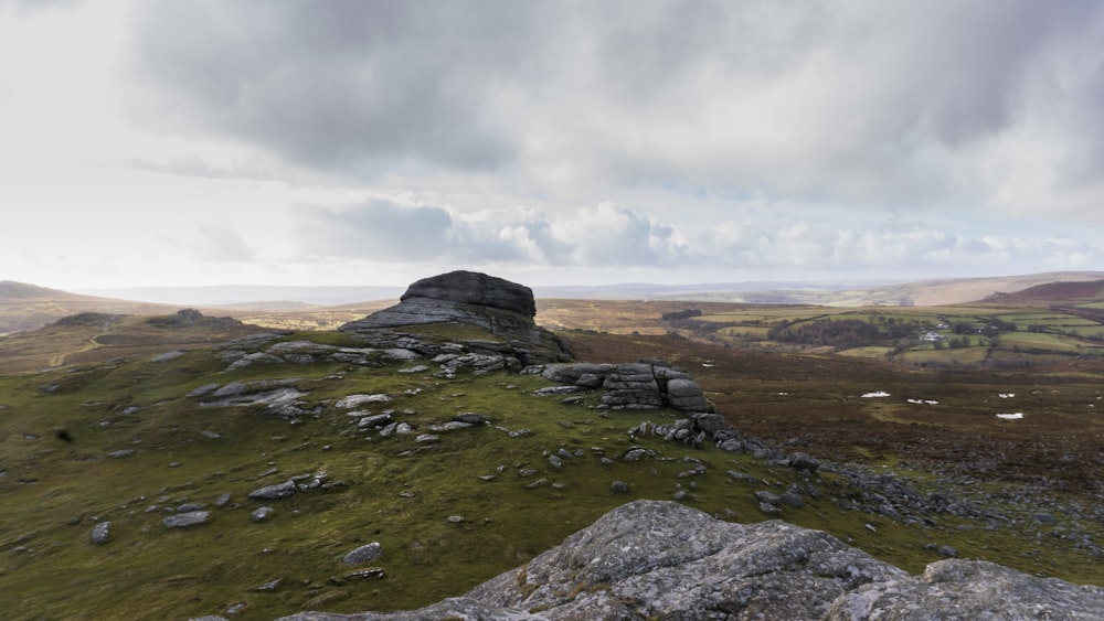 An photo taken looking across Dartmoor with Tors in the Foreground