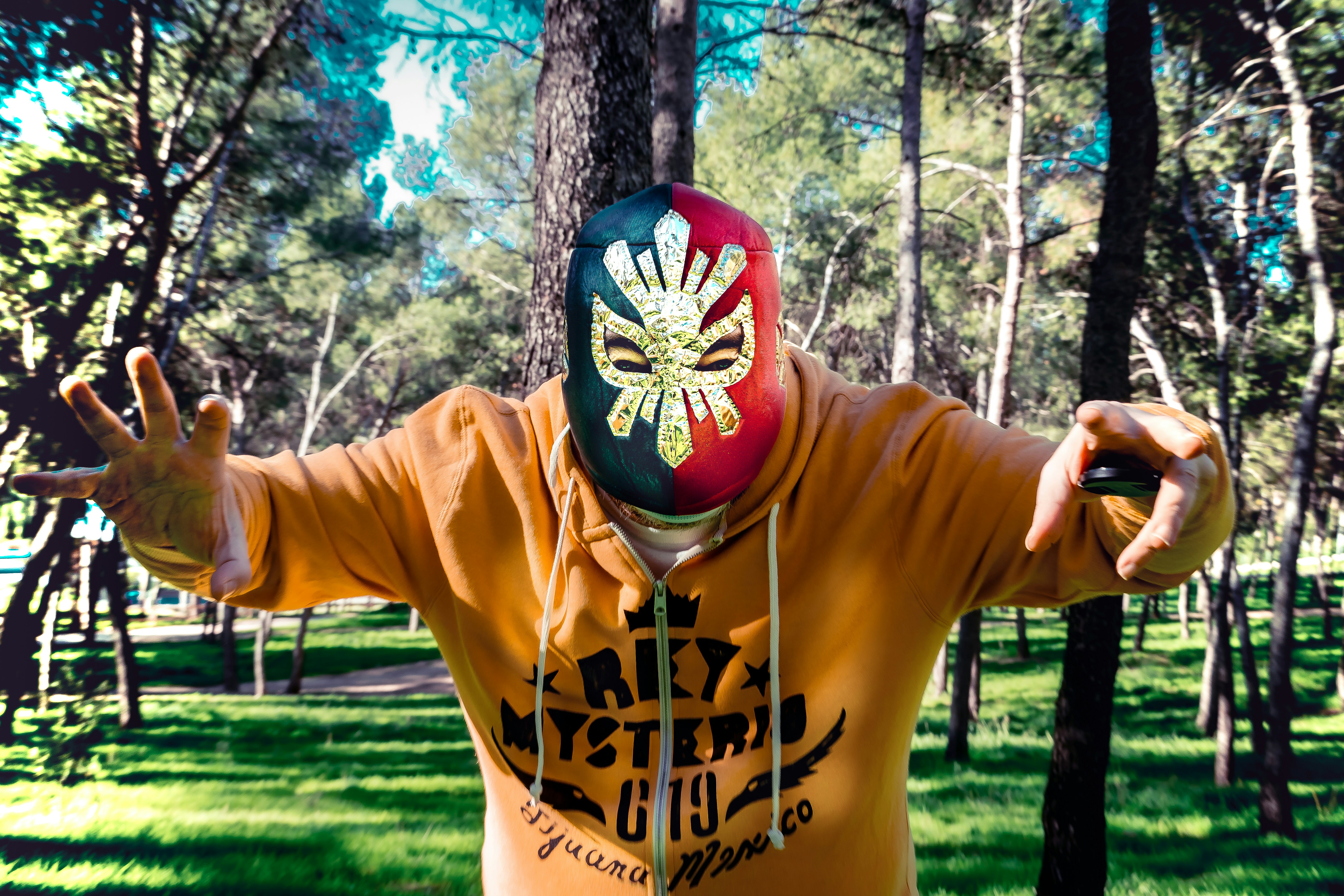person in yellow and black spider man costume