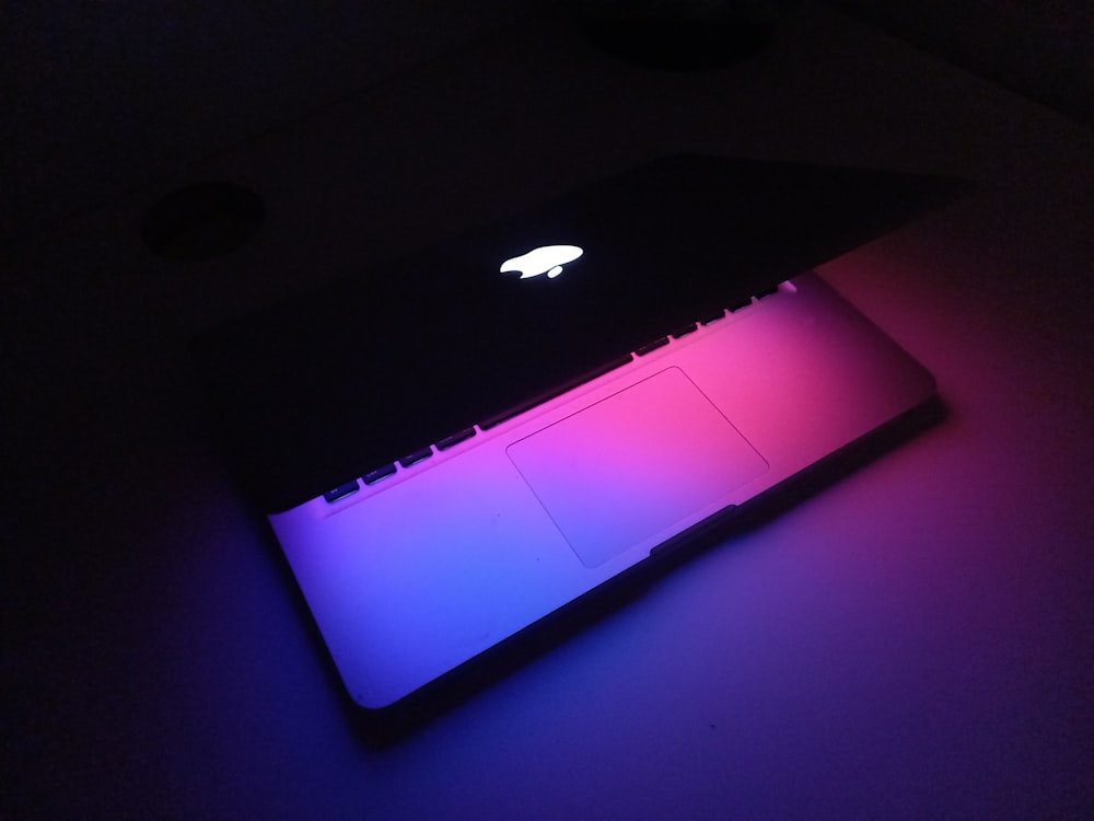 purple and black laptop computer