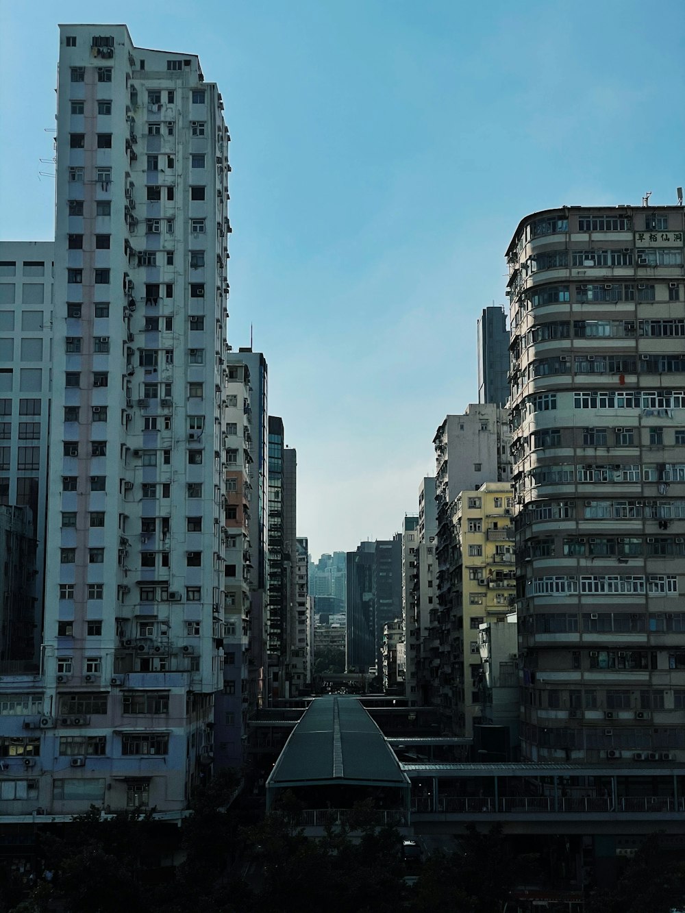 white concrete building under blue sky during daytime