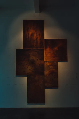 Decorative panels displayed against a clean wall, highlighting diverse textures and colors.